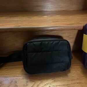 Lole black Fanny pack with fuzzy hand rest